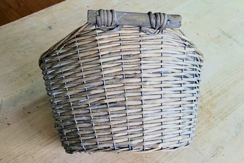 Thrift store grey wicker basket