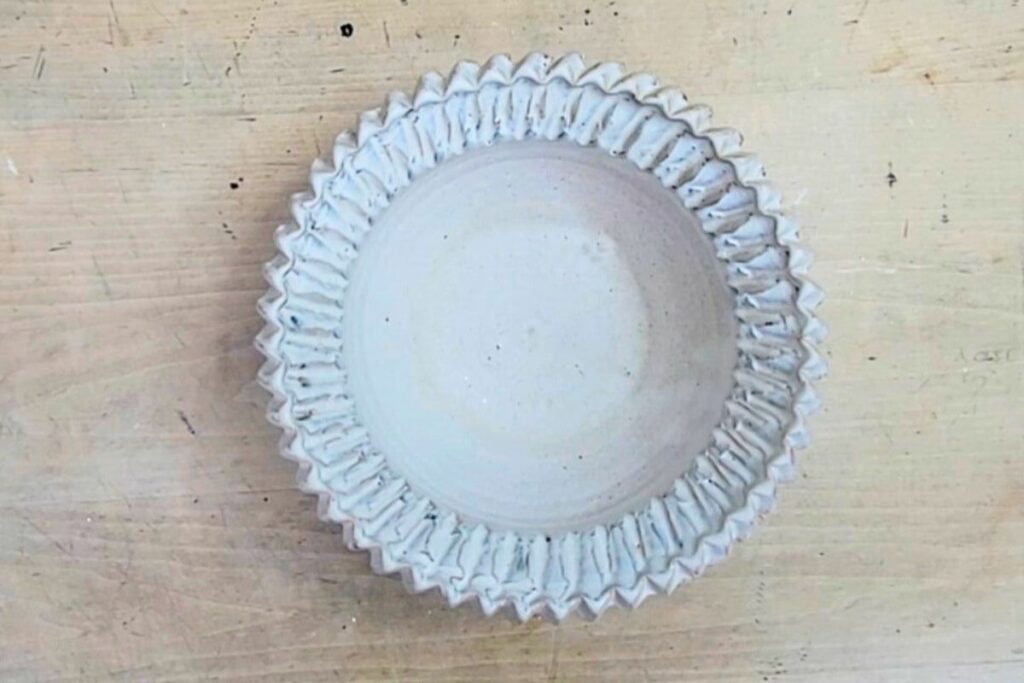 What ceramic bowl with scalloped edges